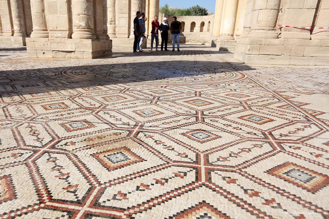 Tourists visit the historical Umayyad Palace which is the largest ancient mosaic in Middle East. 20th October 2016 [Issam Rimawi/Anadolu]