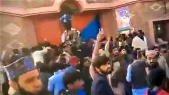 A mob stormed the Nankana Sahib Police station, dragged man accused of blasphemy, and lynched him. (Screengrab)