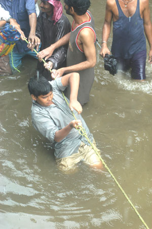 HAND IN HAND – Saluting the unsung heroes of the 2005 deluge HAND IN HAND – Saluting the unsung heroes of the 2005 deluge
